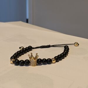 Black Beaded Bracelet with Gold Crown Charm